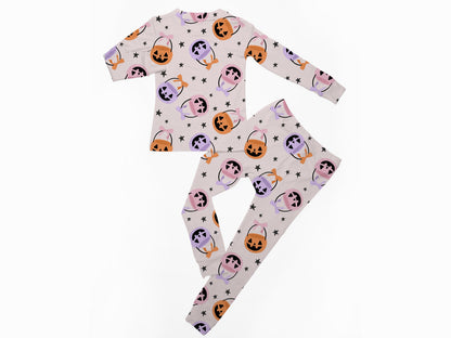 Halloween Bamboo Pajamas for Girls in a Blush Pink with purple and pink pumpkin buckets