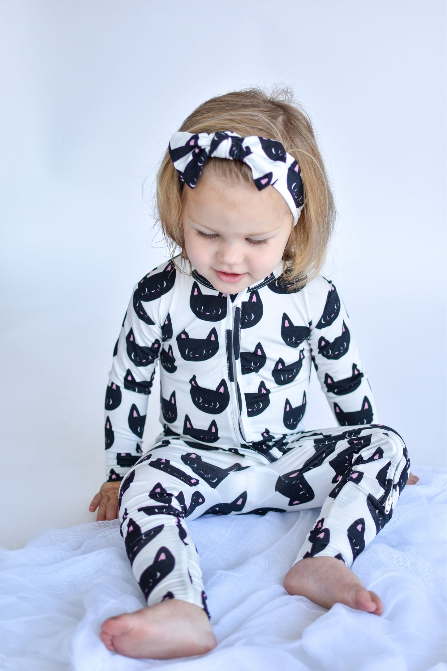 Halloween Zippered Sleeper for Babies in Black Cat Print Called Binx